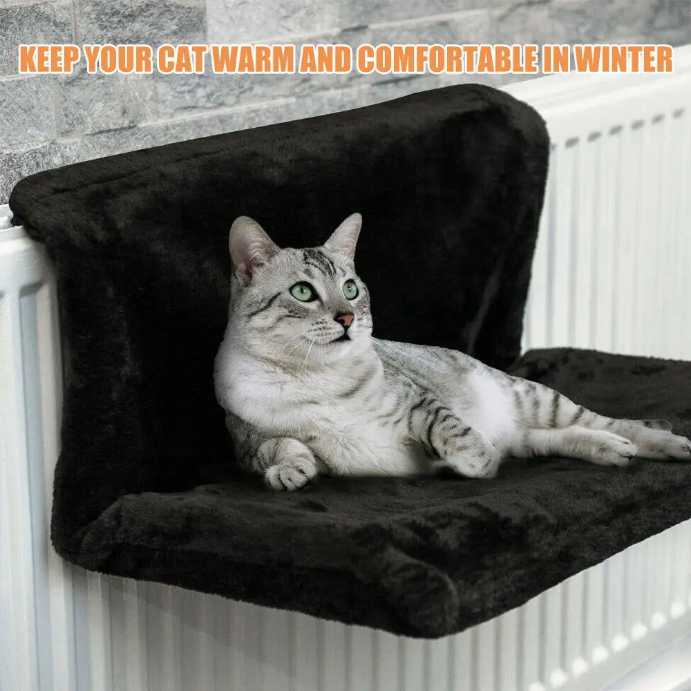 Cat relaxing in a plush hanging radiator bed – photo 2
