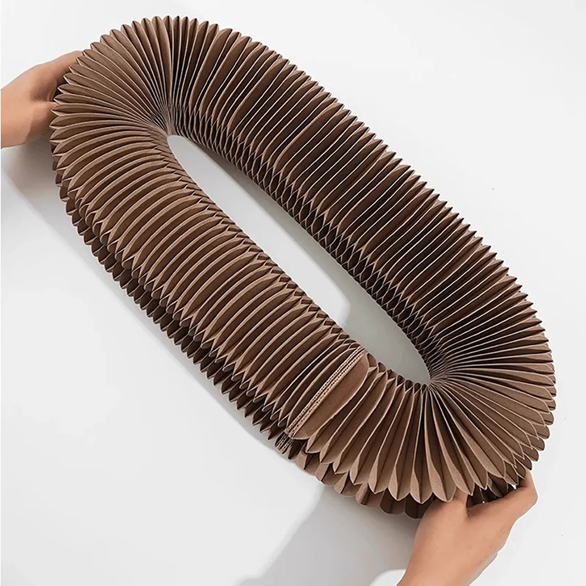 Twisting corrugated cardboard cat scratcher toy with bell ball