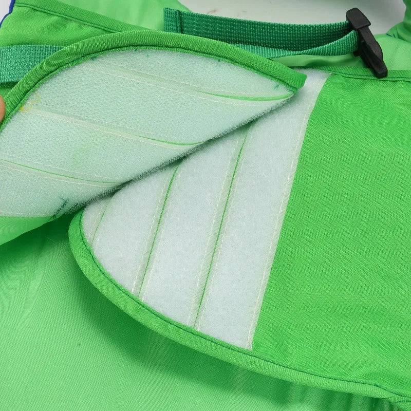 Dog wearing a bright adjustable life jacket for swimming – photo 12