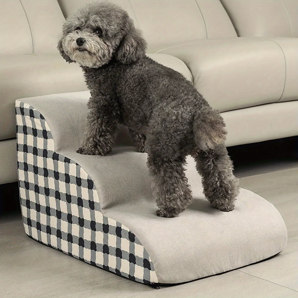 Foam pet stairs beside a sofa