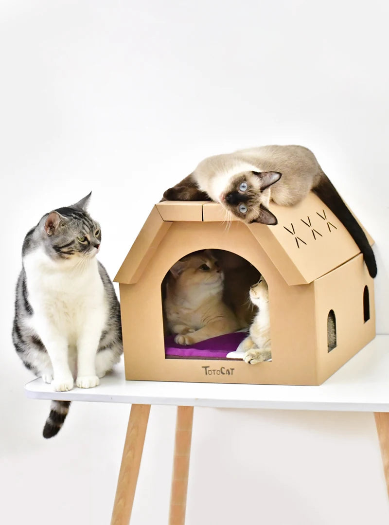 Cardboard cat scratcher house with scratch pads – photo 6