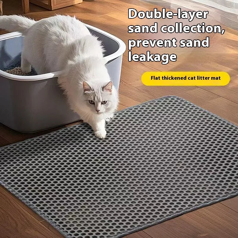 Two-layer cat litter mat in front of a litter tray