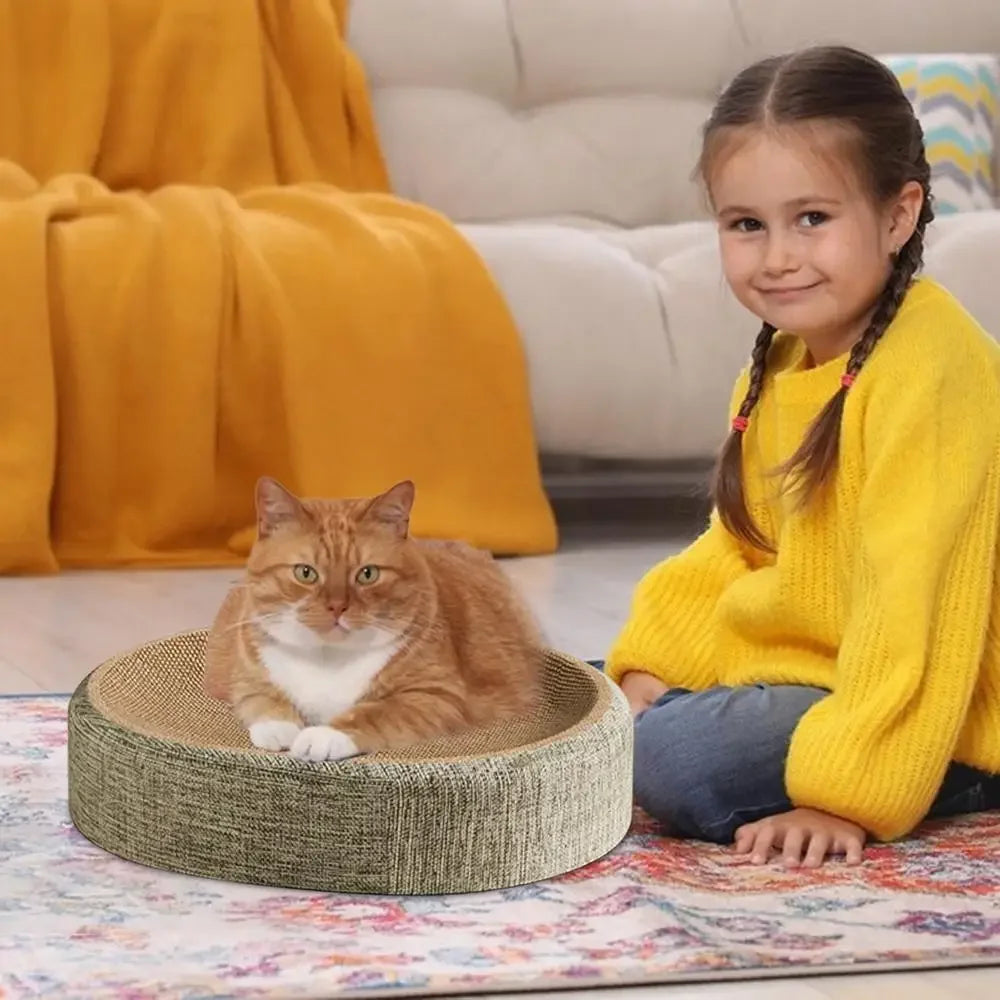 Cat lying on an oval woven cat scratcher bed – photo 8