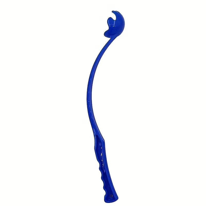 Dog ball launcher stick with a tennis ball in the park – photo 10