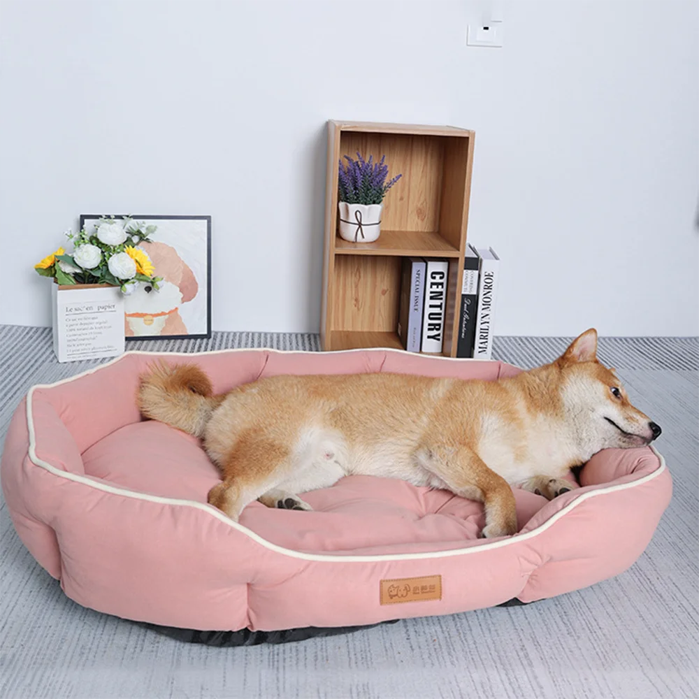 Dog resting in a corduroy pet sofa bed – photo 2