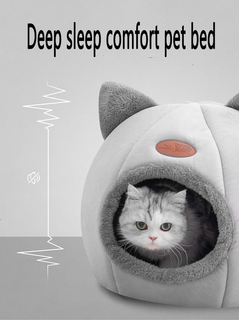 Cat resting in a cosy cave bed – photo 8