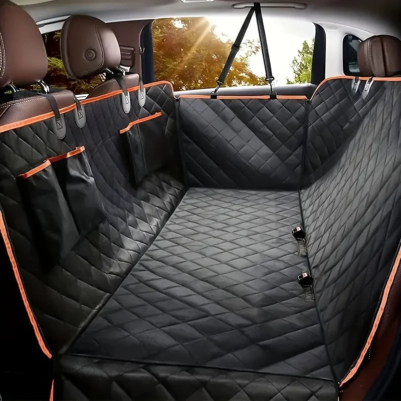 Waterproof dog hammock fitted across a car back seat