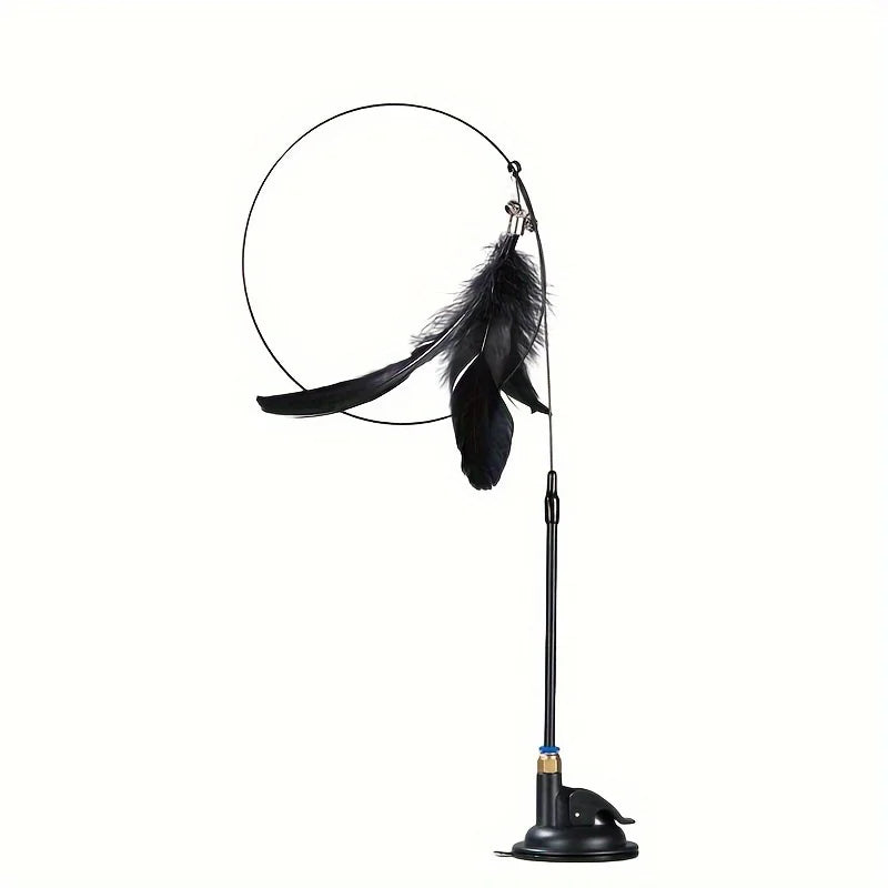 Cat playing with a feather and bell teaser wand on a suction cup – photo 8