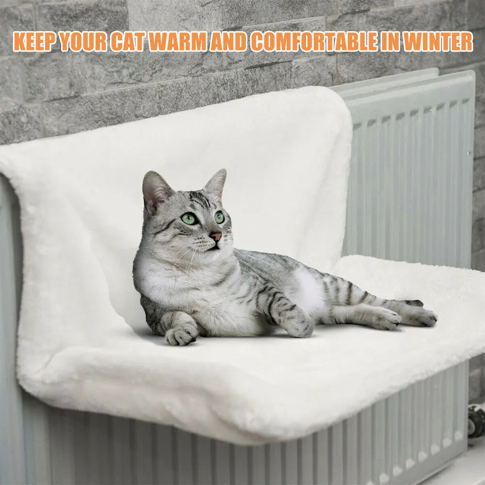 Cat relaxing in a plush hanging radiator bed – photo 12